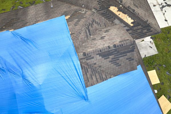 Storm Damage Roof Tarping Service